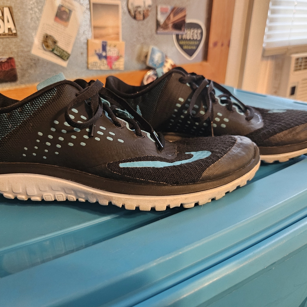 Nike Black and Blue Athletic Shoes with Textured Design